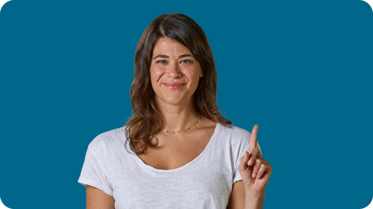Adult woman at least 19 years of age smiling and holding up one finger
