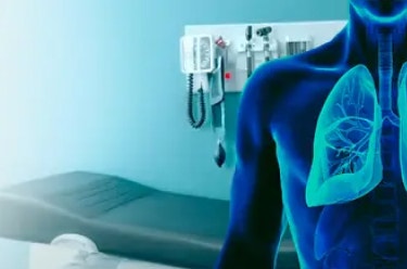 Image of blue human body, with lungs highlighted