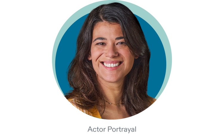 Adult woman smiling with blue background